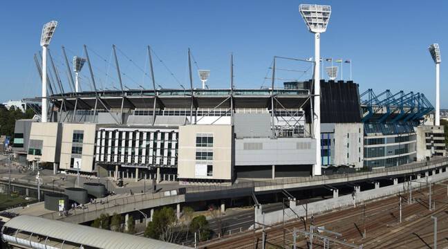 A positive audience at the Melbourne Stadium, thousands urged people to isolate themselves