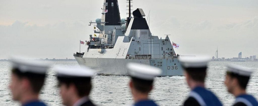 Russia says it fired warning shots at a British ship, London denies this