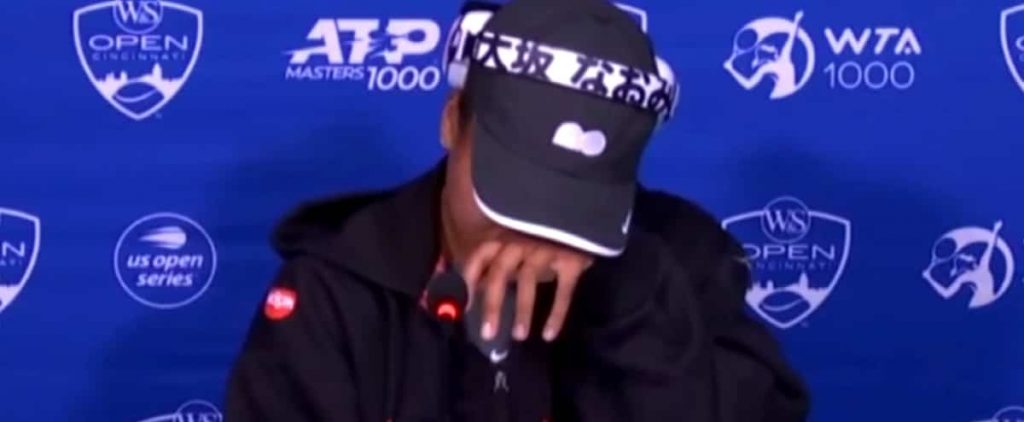 Naomi Osaka breaks down in tears during a press conference