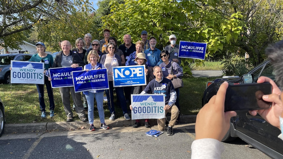 A group of Democratic volunteers prepare to go door-to-door in Leesburg, Virginia.