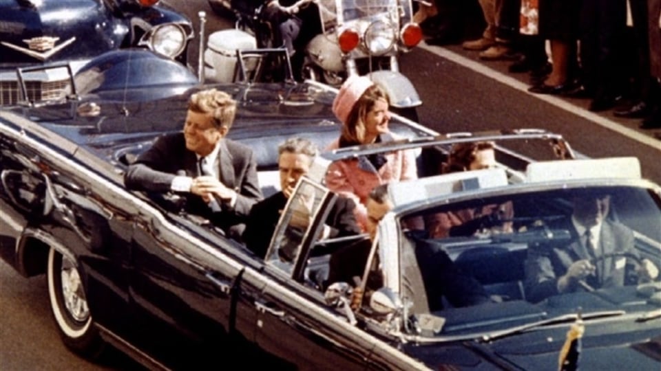 JFK and Jacqueline Kennedy in the presidential car