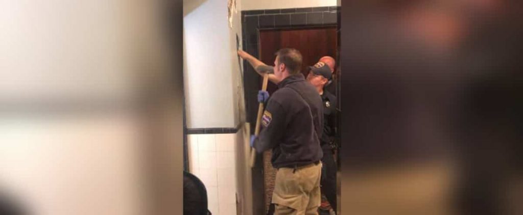 Shame of a man stuck in a theater wall