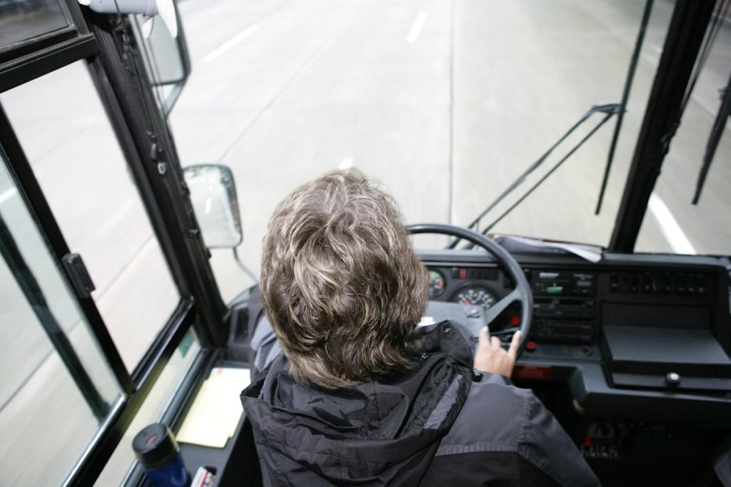 A bus driver was fired for his short stature
