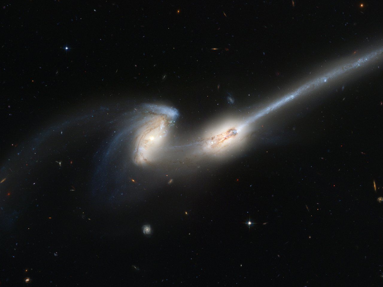 These two galaxies, nicknamed "mice" Currently merging