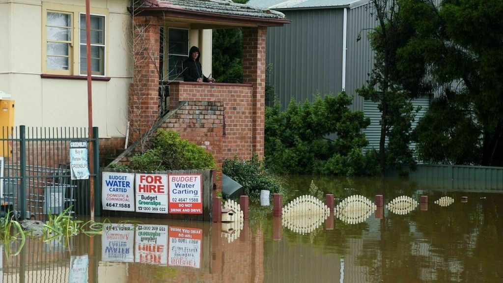 Thousands evacuated as floods hit Australia