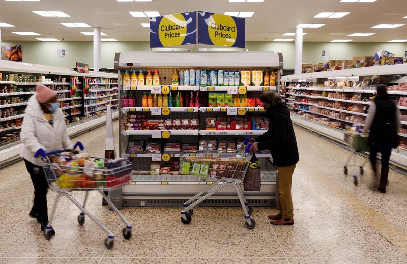 FILE PHOTO: Inside a branch of a Tesco Extra supermarket in London