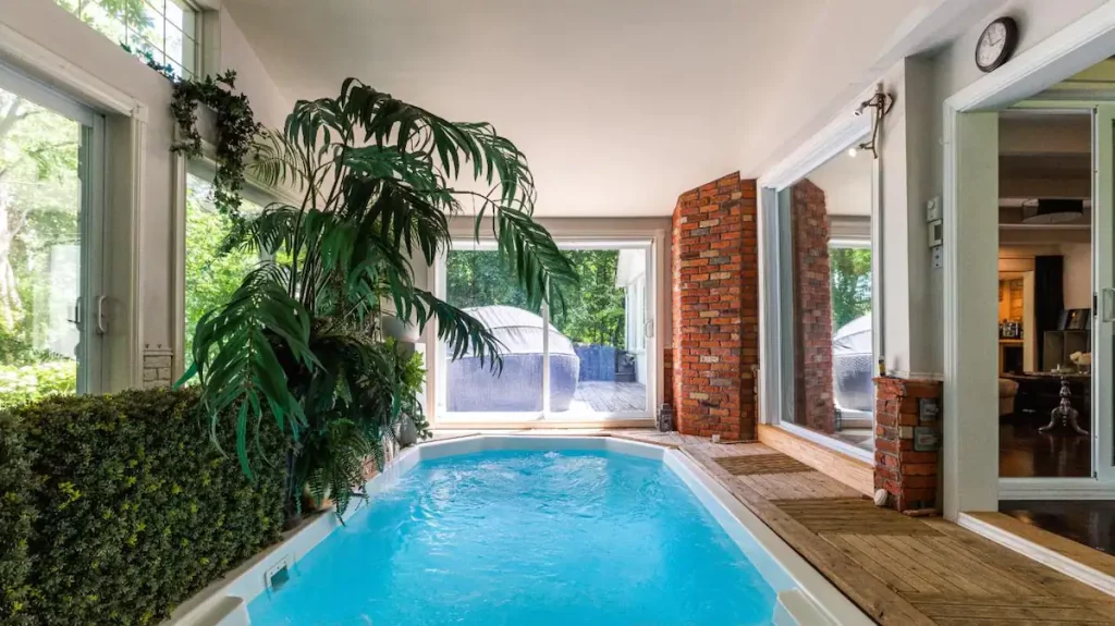 Gorgeous waterfront house with indoor pool for sale in Laval for $1,199,000