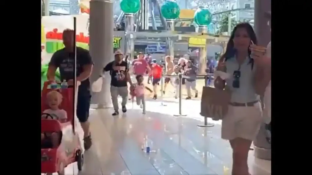 Scenes of panic after the shooting in the largest shopping mall in America