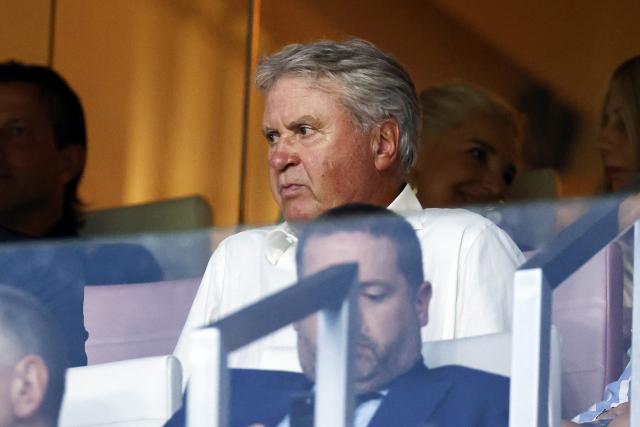 Australia's assistant coach Guus Hiddink will not go to the World Cup in a friendly