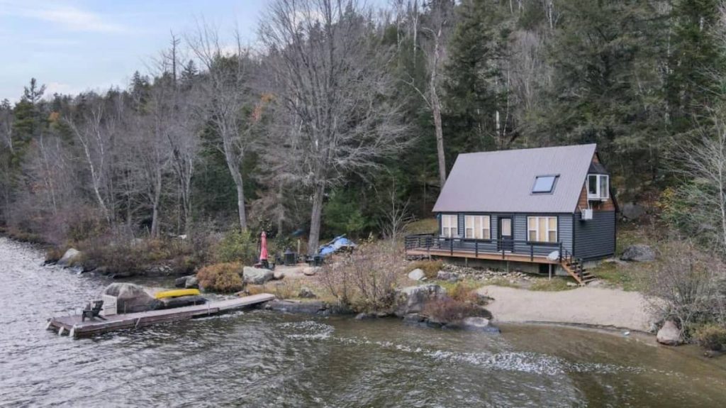 Mysterious chalet on the edge of a lake in Duhamel for sale at $549,900