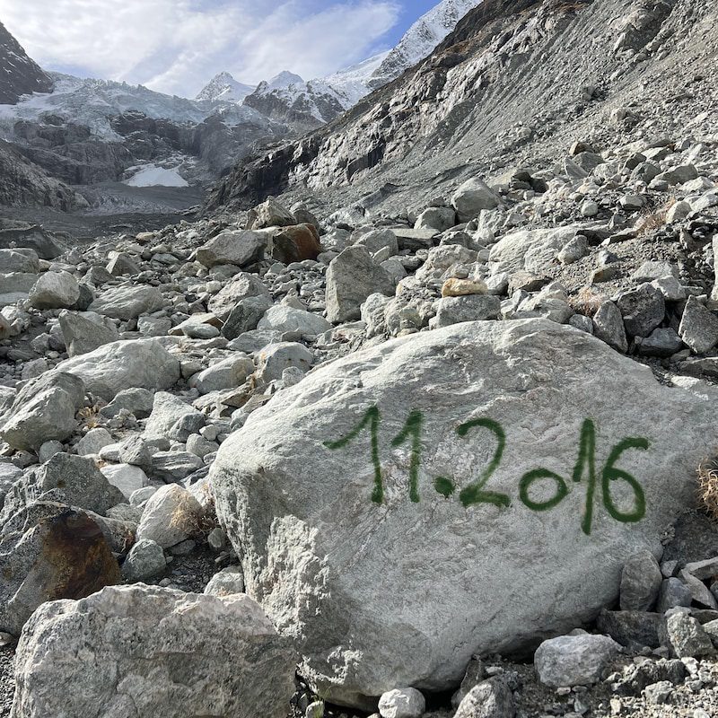 An inscription marking the location of the base of the Mont Miné glacier in November 2016.
