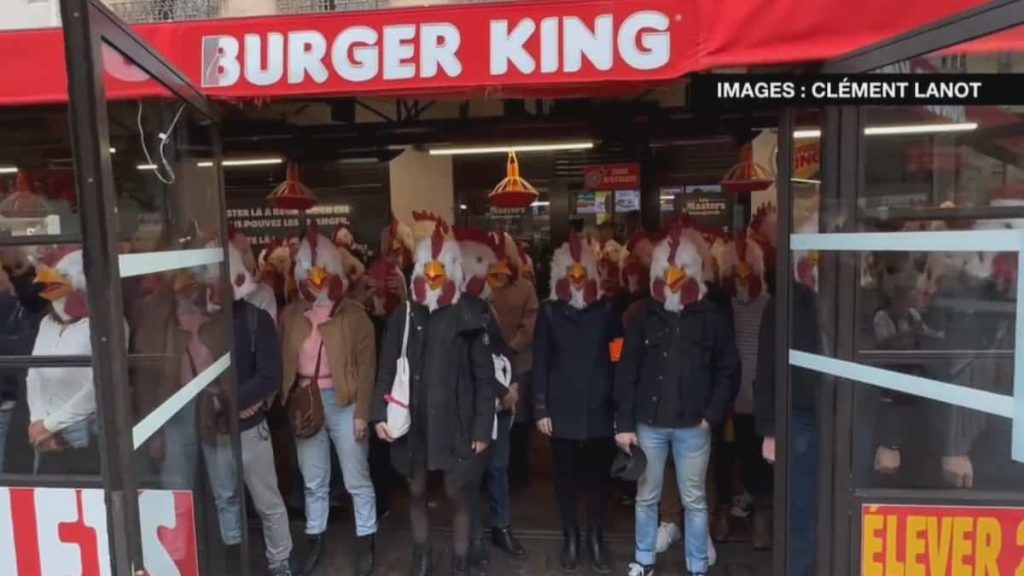 on video |  Disguised as chickens, activists invade Burger King