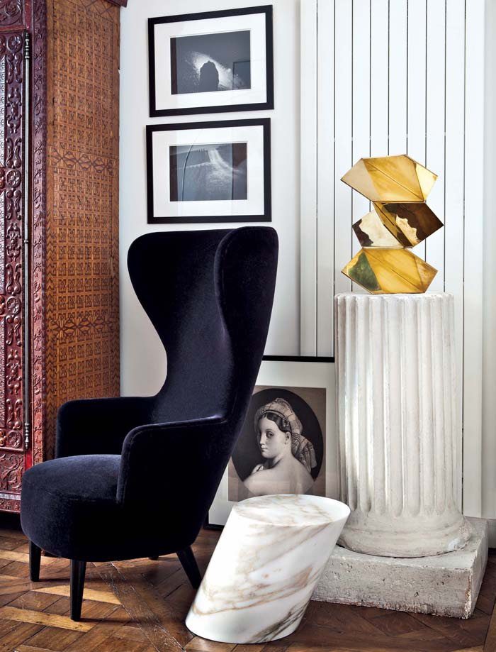 The black chair by Til Dixon and the truncated column in the living room